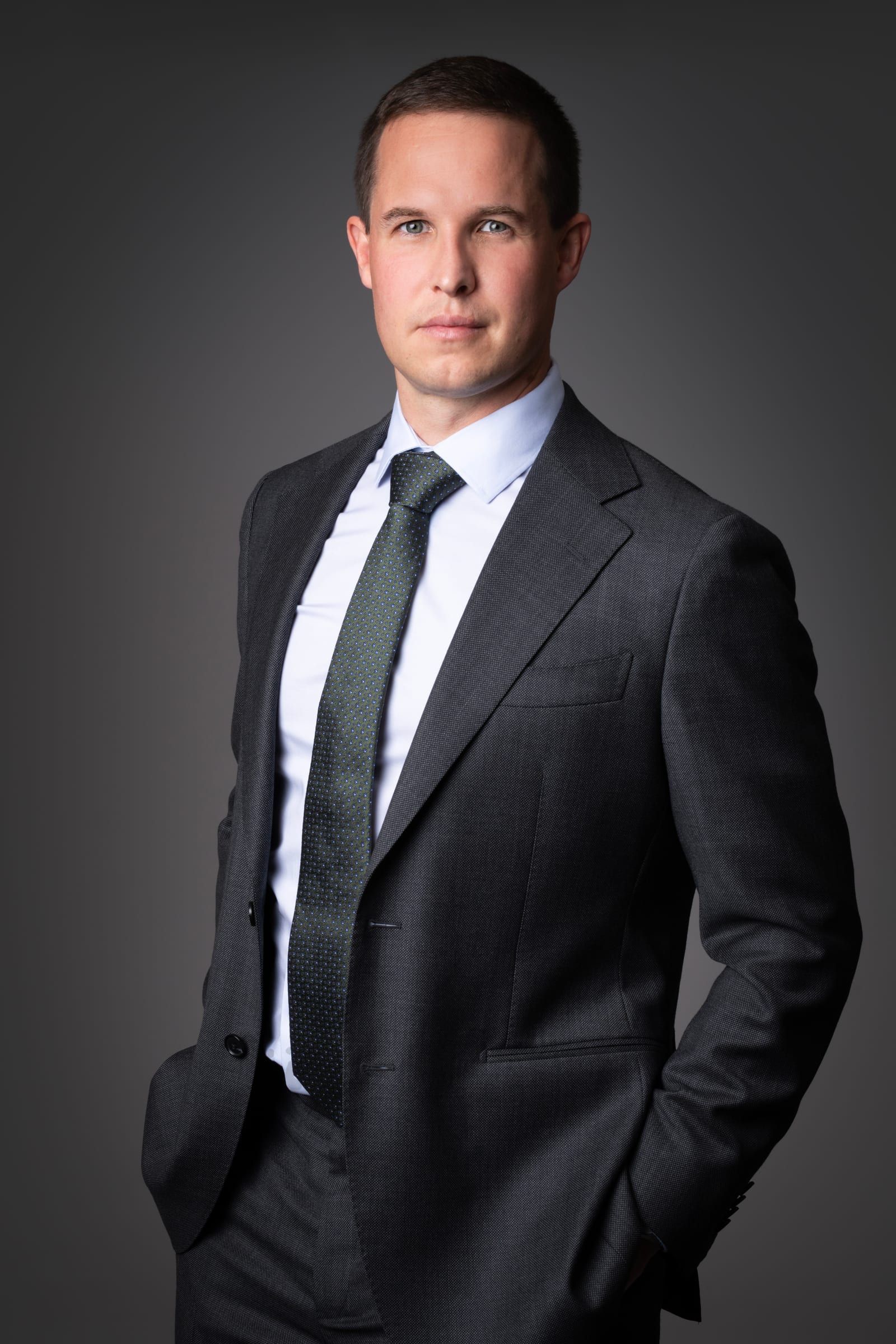 Professional LinkedIn portrait taken in a studio in the Waterloo area