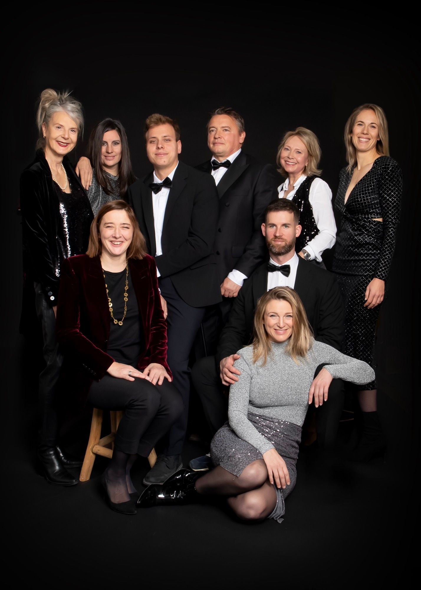 Studio group portrait of a company team on a black background, by VDPhotography in Walloon Brabant (2)